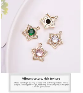 Macro shot of gold-plated star charms featuring green, pink, white, and black zircons