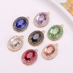 Set of seven colorful oval crystal pendants with gold alloy base and micro-inlaid rhinestones