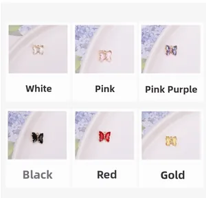 Détails macro de breloques papillon en cristal coloré pour la création de bijoux DIY variés