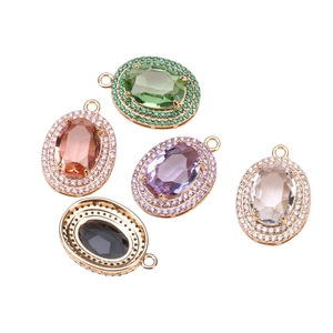Set of five oval crystal pendants with diamond halo and 18K gold plated metal loop