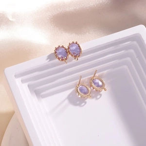 14K gold filled oval purple crystal stud earrings with rose gold prong setting and silver pins