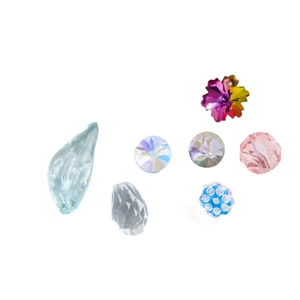 Assorted colorful glass flower beads and crystal charms for DIY jewelry making