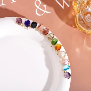 Set di 12 ciondoli ovali in cristallo colorato con montatura dorata per creazione gioielli