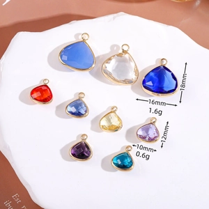 Colorful triangular crystal birthstone pendants with gold frames in various sizes