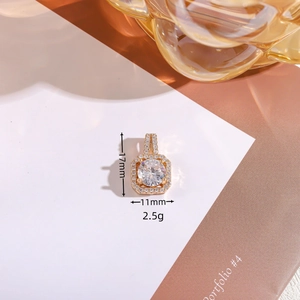 Square gold pendant dimensions: 17mm x 11mm with white cubic zirconia and round center stone