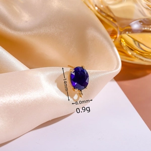 Orecchino ovale placcato oro con gemma blu e perno in argento S925, lungo 14mm