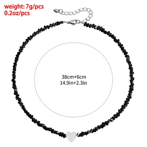 Detail showing weight 7g and length dimensions for beaded heart pendant necklace