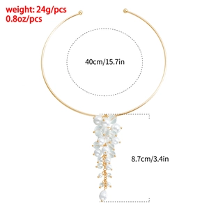 Detailed view of baroque gold metal choker with pearl and crystal pendant with 40cm size info