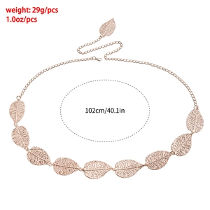 Detail view of rose gold metal waist chain featuring hollow leaf charms and sizing info