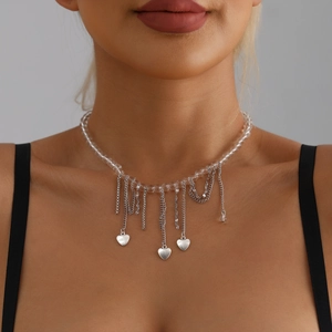 Transparent beaded choker necklace with silver heart fringe tassels and metallic finish
