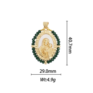 Macro view of 18k gold plated religious pendant with green beads and size dimensions