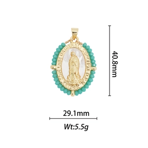Detailed view of Virgin Mary 18k gold plated pendant with size marks 40.8x29.1mm