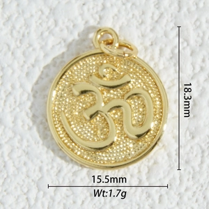 Macro detail of 18K gold Om pendant showing 18.3mm height and 15.5mm width dimensions