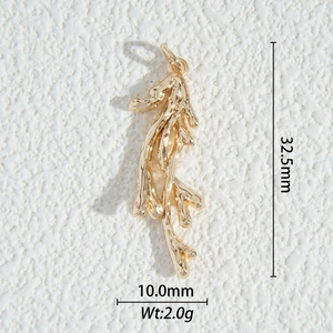 Detail of coral branch shaped 18K gold plated pendant with size 32.5mm and weight 2.0g