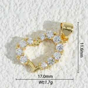 Detailed macro of 18K gold plated heart pendant with pavé cubic zirconia 11.6x17mm