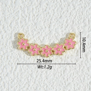 Detail view of 18K gold plated pink flower pendant with size measurements 25.4mm x 10.4mm