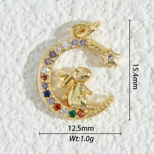 Detailed macro view showing the 15.4mm x 12.5mm gold crescent moon and rabbit charm