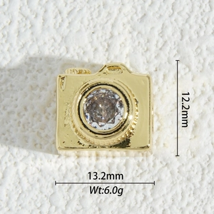 Macro shot of 18K gold plated camera pendant with large zircon stone inlay 13.2mm