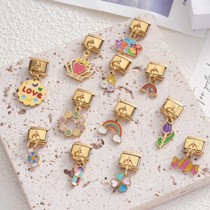 Italian charm bracelet links in gold stainless steel with enamel flower and heart motifs