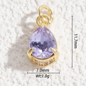 Macro shot of 11.7mm lavender faceted crystal teardrop pendant with gold-plated setting