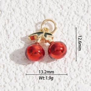 Close-up of red cherry pendant showing 13.2mm width and 12.6mm height dimensions