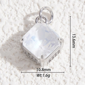 Macro shot showing dimensions of 13.6mm faceted crystal pendant with silver setting
