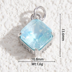 Macro shot of 13.6x10.8mm light blue faceted crystal pendant with micro-pave side stones