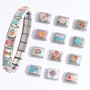Italian modular charm bracelet in 18k gold plated steel with floral enamel designs