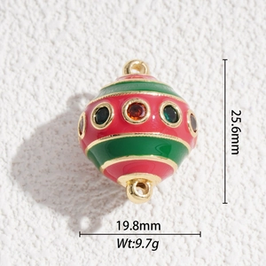Macro view of Christmas balloon pendant dimensions 25.6x19.8mm in gold plated enamel