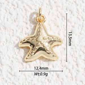 Detailed close-up of 13.5mm gold plated starfish pendant with embossed dot texture