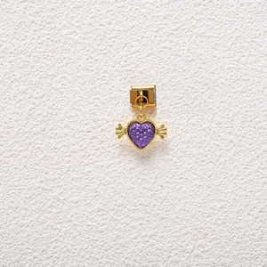 Detail of Italian charm link featuring a purple heart gemstone with golden wings
