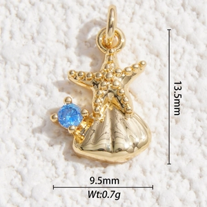 Macro detail of gold plated starfish and shell pendant showing precise size 13.5x9.5mm