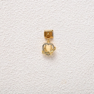 Detail of heart charm with cat eye stone and cubic zirconia for modular bracelet