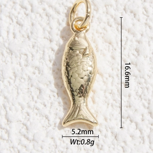 Macro view of gold-plated fish pendant with detailed scales and dimensions 16.6x5.2mm