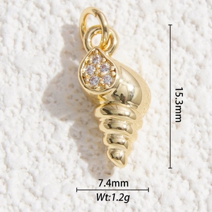 Gold plated conch shell pendant with zircon inlays and dimensions 15.3mm by 7.4mm