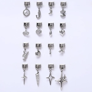 Detailed view of 16 Italian charm links in polished steel featuring various charms