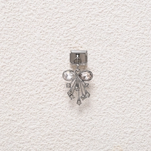 Italian charm link featuring a silver bow pendant with sparkling white crystals