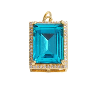 Elegante ciondolo con cristallo blu cielo taglio smeraldo e placcatura in oro giallo