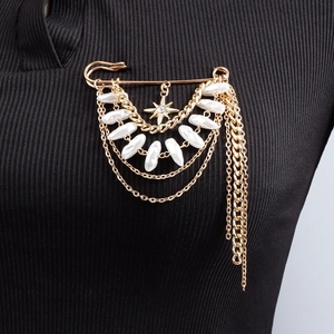 Retro multi-layer gold tassel brooch with star pendant and white pearls on black fabric