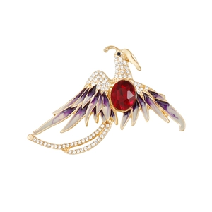 Broche phénix élégante avec rubis rouge et ailes en émail dégradé violet et or