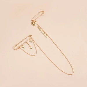 Vintage golden heart chain brooch with decorative safety pins and multiple pendants