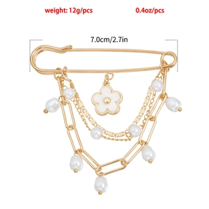 Detail showing dimensions of gold safety pin brooch with white pearls and flower pendant