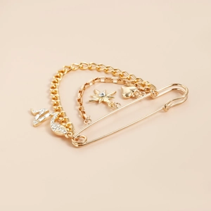 Broche vintage dorée à chaînes multiples avec pendentifs cœur et étoile