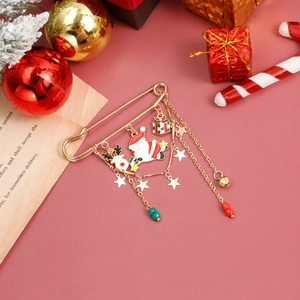 Christmas brooch with Santa Claus, reindeer and bells on gold safety pin decoration