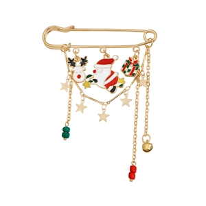 Christmas brooch with golden Santa Claus, reindeer and colorful charms on white background