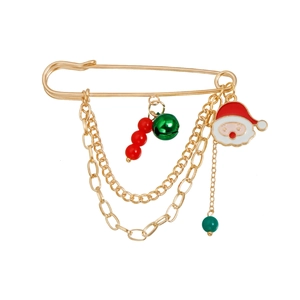 Detail of Christmas brooch with Santa charm, green bell, and golden layered chains