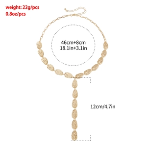 Detail view of irregular gold leaf Y-necklace with dimensions and weight info