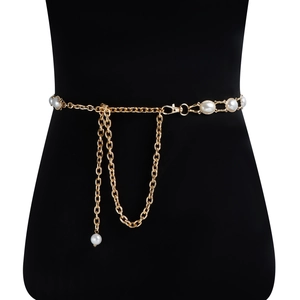 Detailed view of golden metal waist chain featuring oval pearls and adjustable lobster clasp