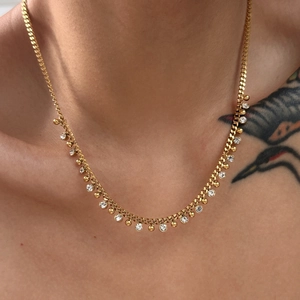 Elegant gold titanium steel necklace with sparkling crystal charms and gold spheres