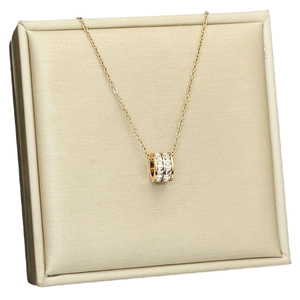 Roségouden titanium stalen ketting met cilindervormige hanger en zirkoniasteentjes